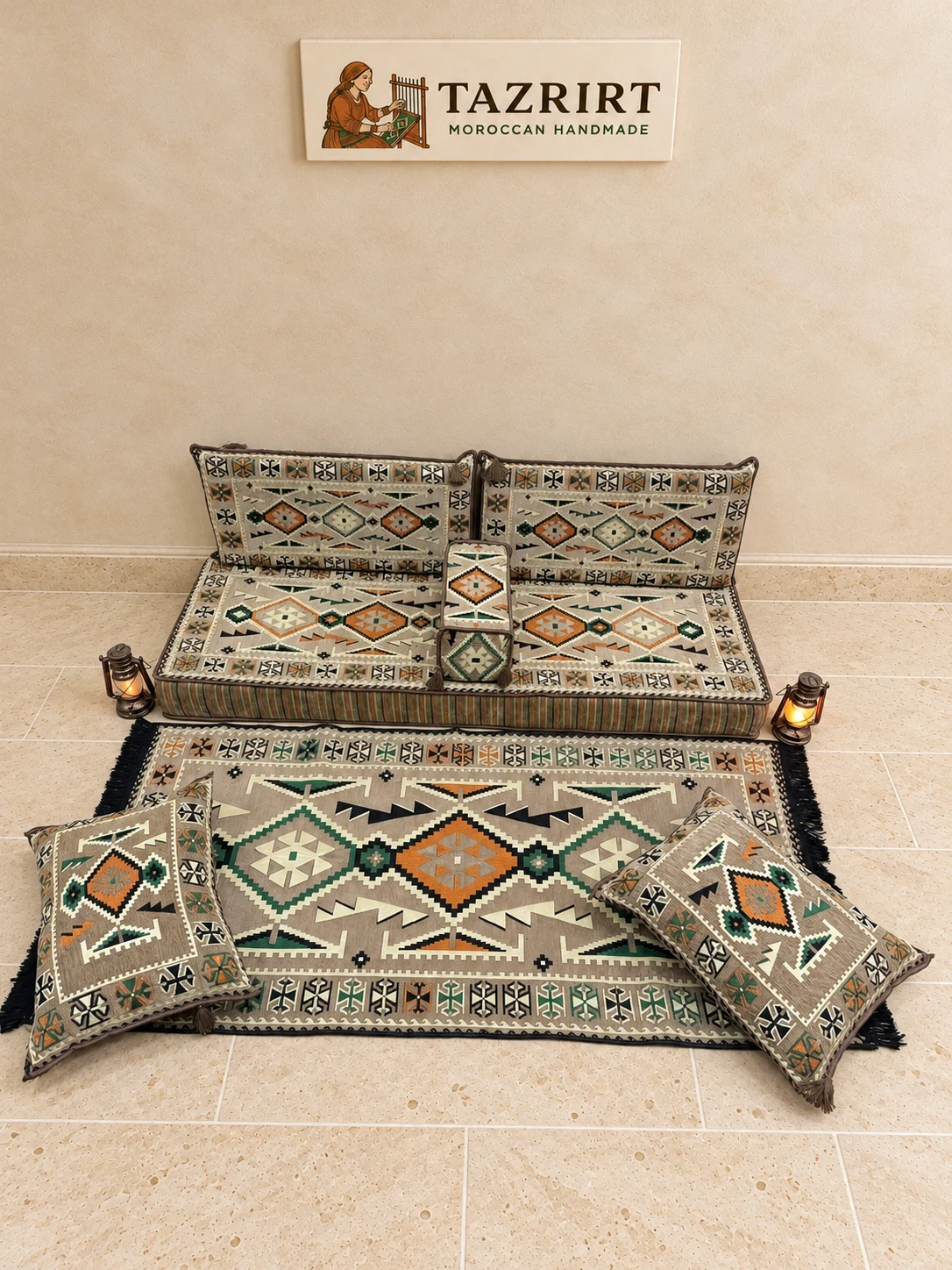 Beige Sahrawi single majlis set seen from the front: floor seat, two back cushions, armrest, two floor cushions and matching rug