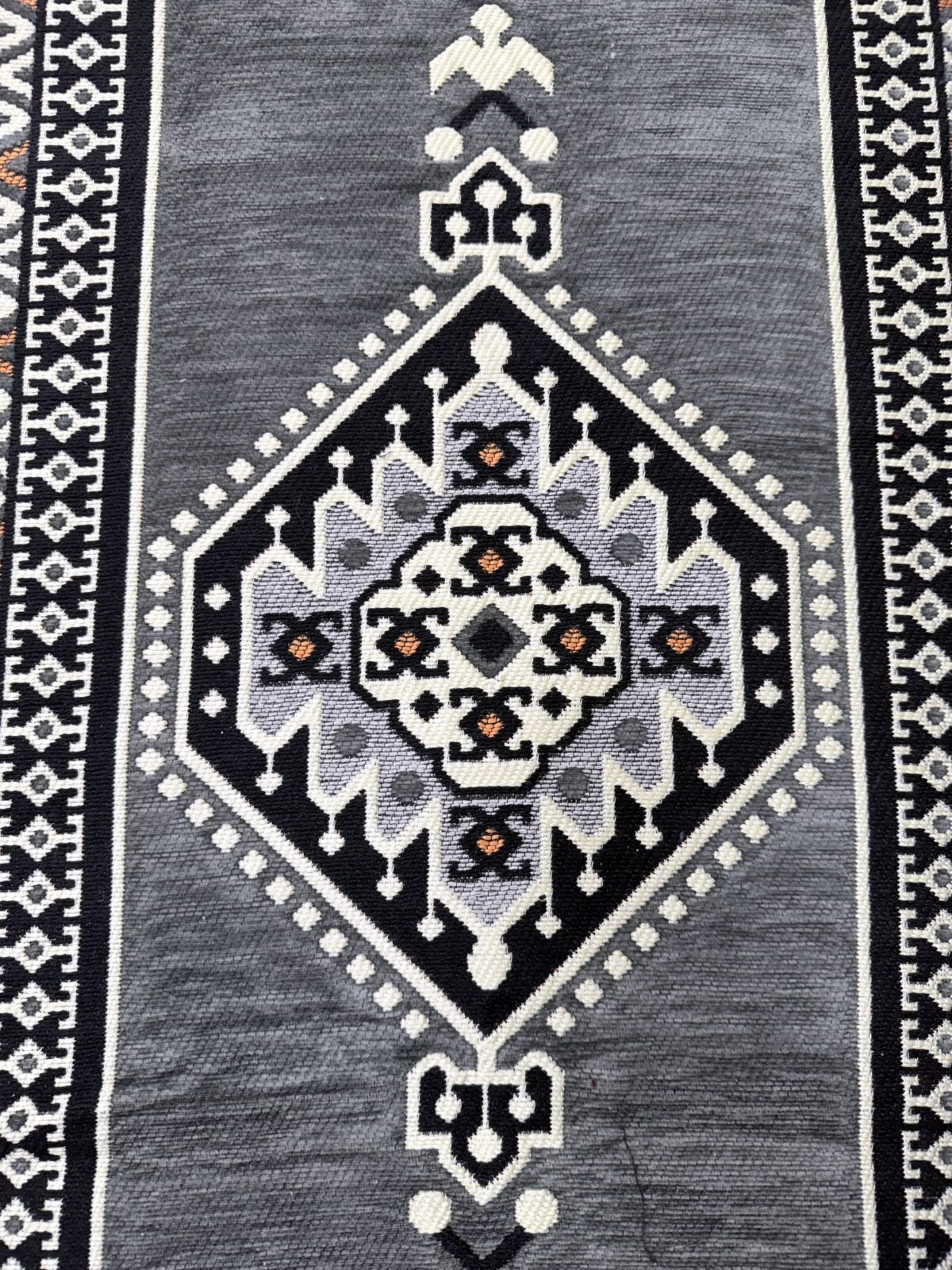 Grey Sahrawi majlis fabric seen up close
