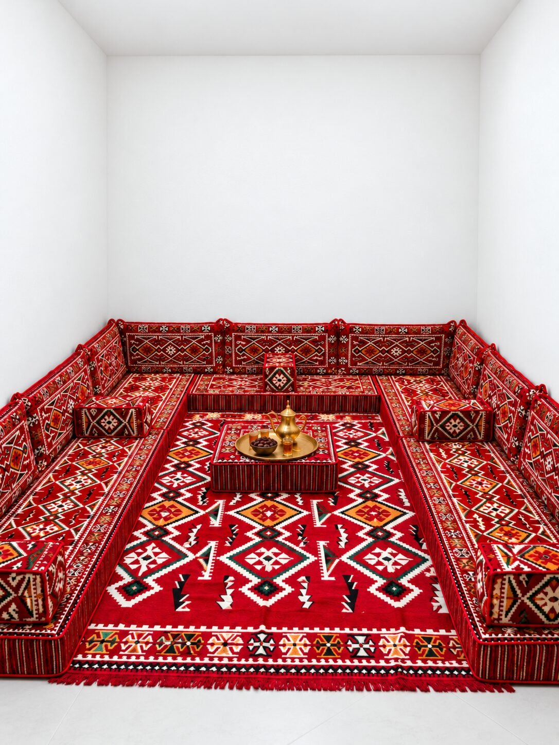 Oued Eddahab crimson Sahrawi majlis with matching rug and brass tea set
