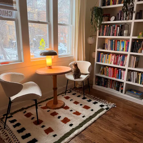 A handwoven Moroccan rug in a reading corner.