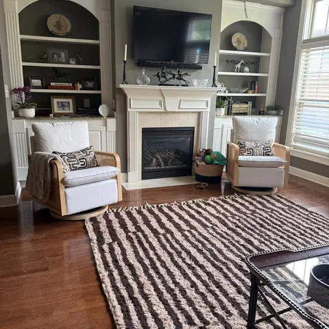 A handwoven Moroccan rug in a living room.
