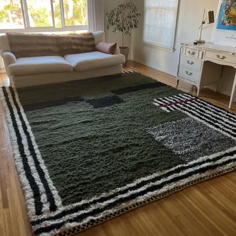 A handwoven Moroccan rug in a living room.