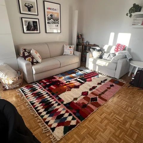 A handwoven Moroccan rug in a living room.